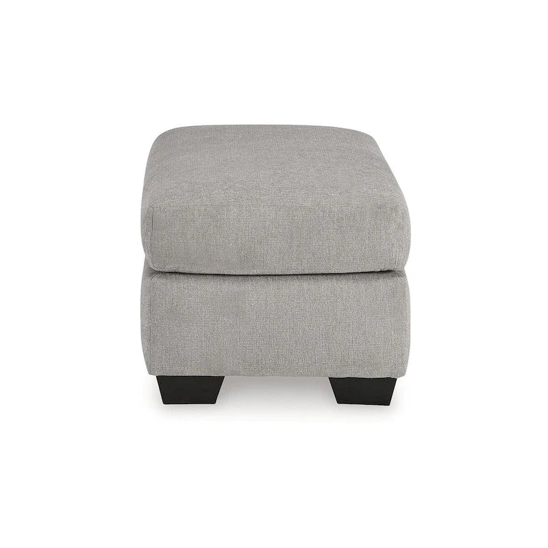 Grau gepolsterter Hocker  